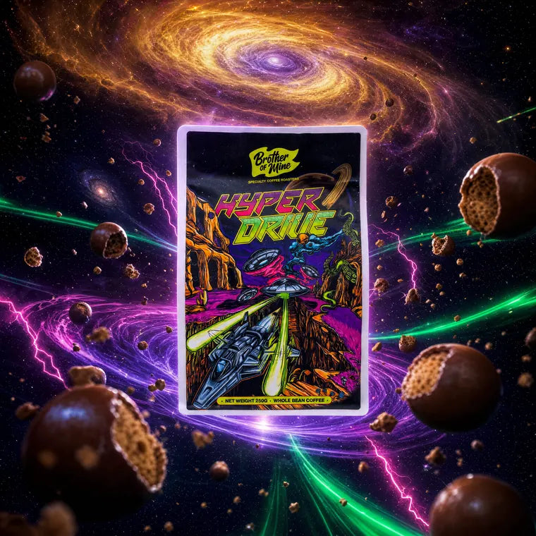 A Hyperdrive bag flying through a purple galaxy with chocolate malt balls